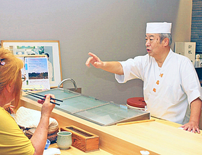 「おいしい料理を提供していくことが大事」と誓う山沢さん（右）