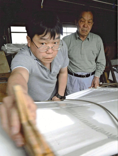 清祐（左）と私。父から子、子から孫へと３代にわたり脈々と技術は受け継がれていくと信じていた