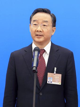 　中国の唐仁健・前農業農村相＝２０２１年、北京（新華社＝共同）