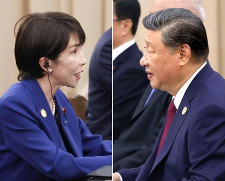 会談する高市首相(左)と中国の習近平国家主席=31日、韓国・慶州(代表撮影・共同)